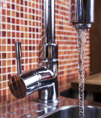 Water Flowing From a Faucet